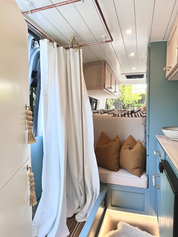 custom sprinter camper van with hidden shower